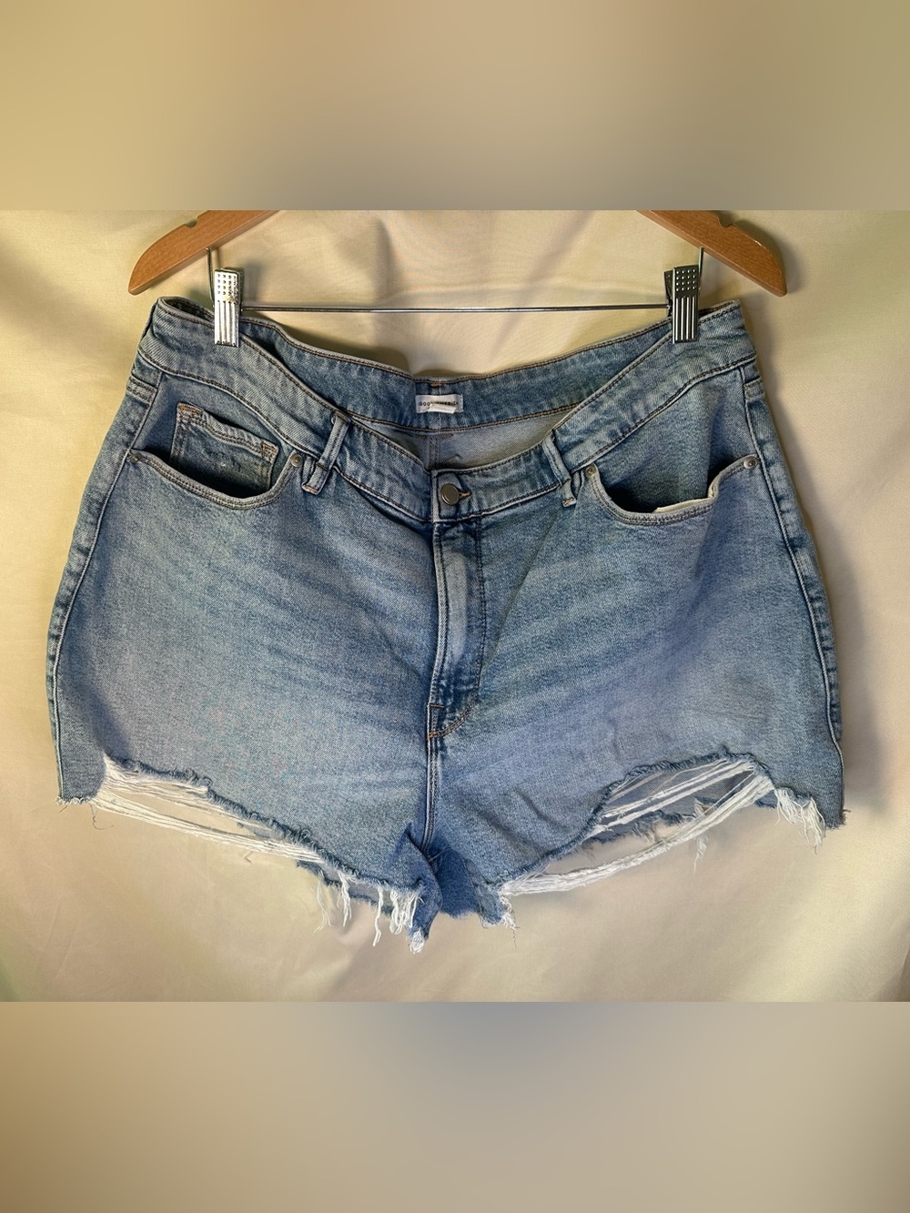 Good American “Good Girlfriend” Light Blue Distressed Denim Cutoff Shorts